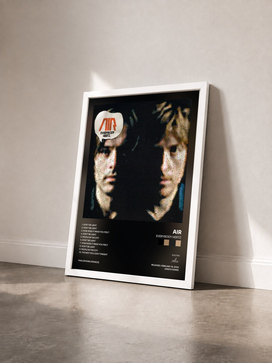 #blanc Tableau de l'album Everybody Hertz de Air vu de trois quarts, cadre blanc