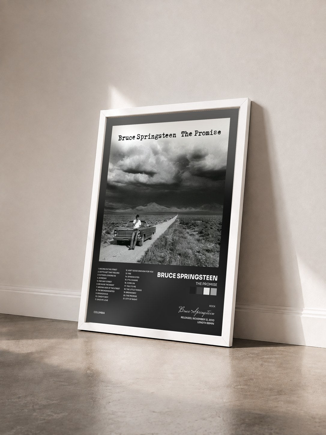 #blanc Tableau de l'album The Promise de Bruce Springsteen vu de trois quarts, cadre blanc
