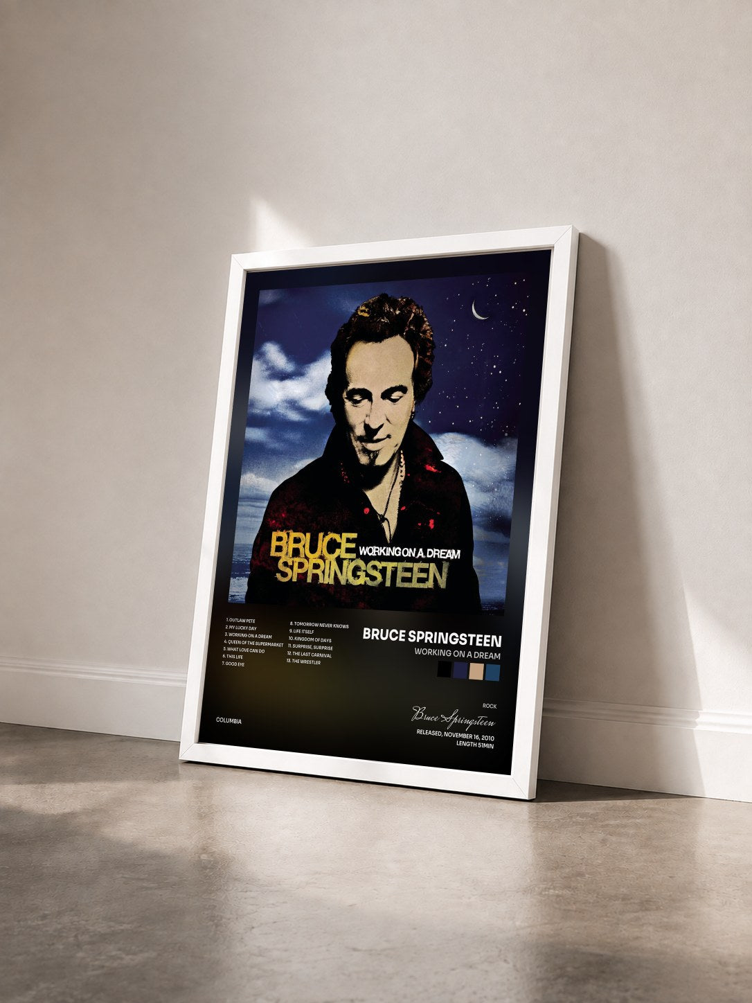 #blanc Tableau de l'album Working On A Dream de Bruce Springsteen vu de trois quarts, cadre blanc