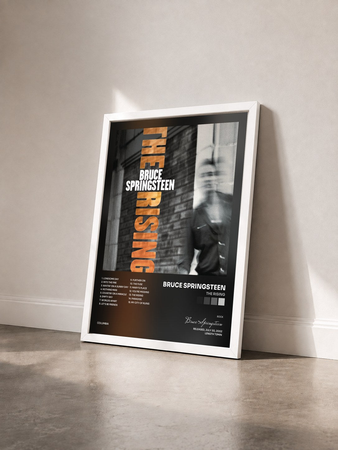 #blanc Tableau de l'album The Rising de Bruce Springsteen vu de trois quarts, cadre blanc