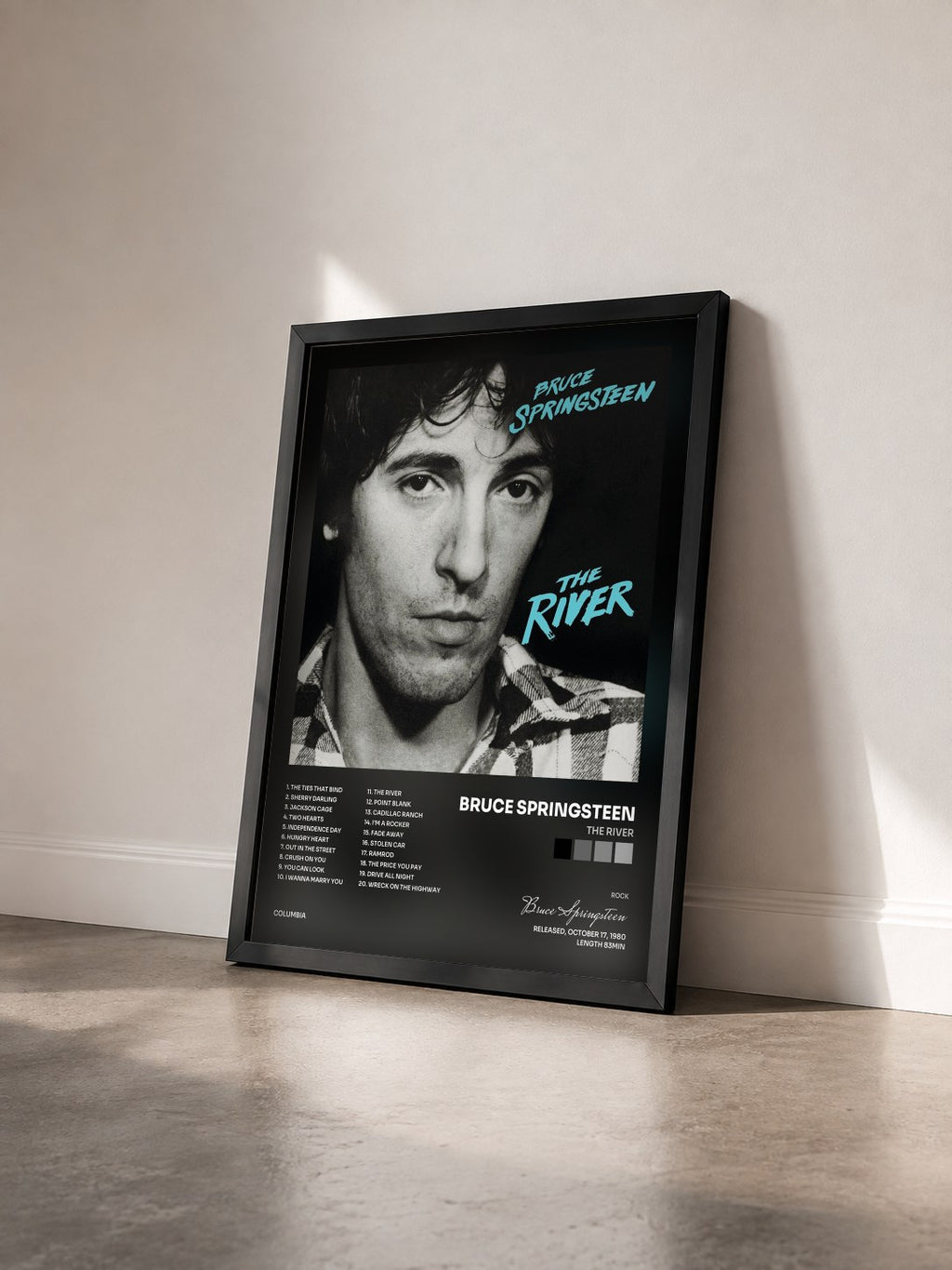 #noir The River von Bruce Springsteen als gerahmter Kunstdruck von schräg gesehen, schwarzer Rahmen