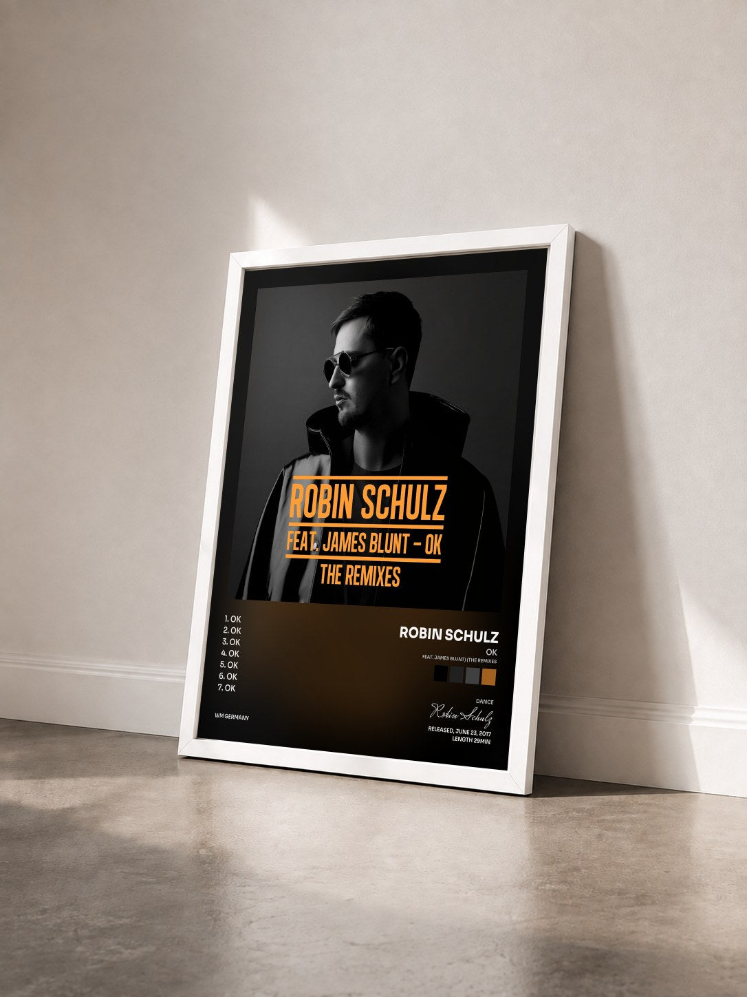 #blanc Tableau de l'album OK (feat. James Blunt) (The Remixes) de Robin Schulz vu de trois quarts, cadre blanc