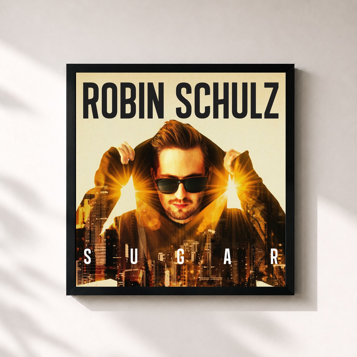 #noir Sugar by Robin Schulz as a square framed art print, black 32x32 cm frame