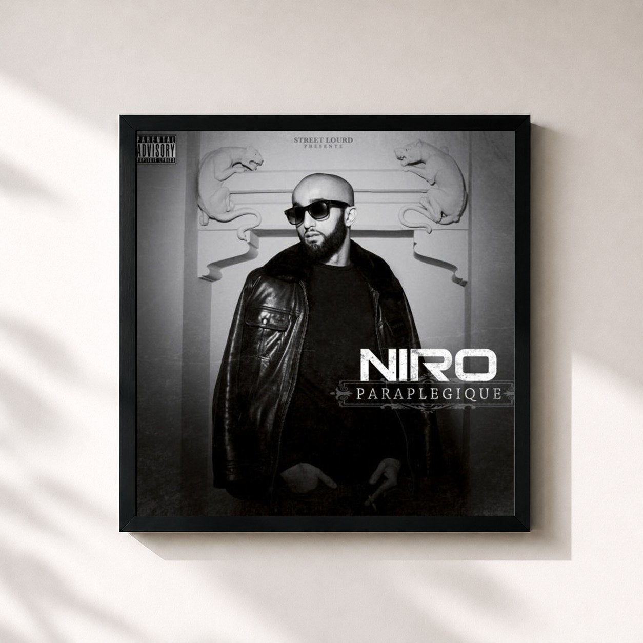 #noir Tableau carré de l'album Paraplégique de Niro, cadre noir 32x32 cm