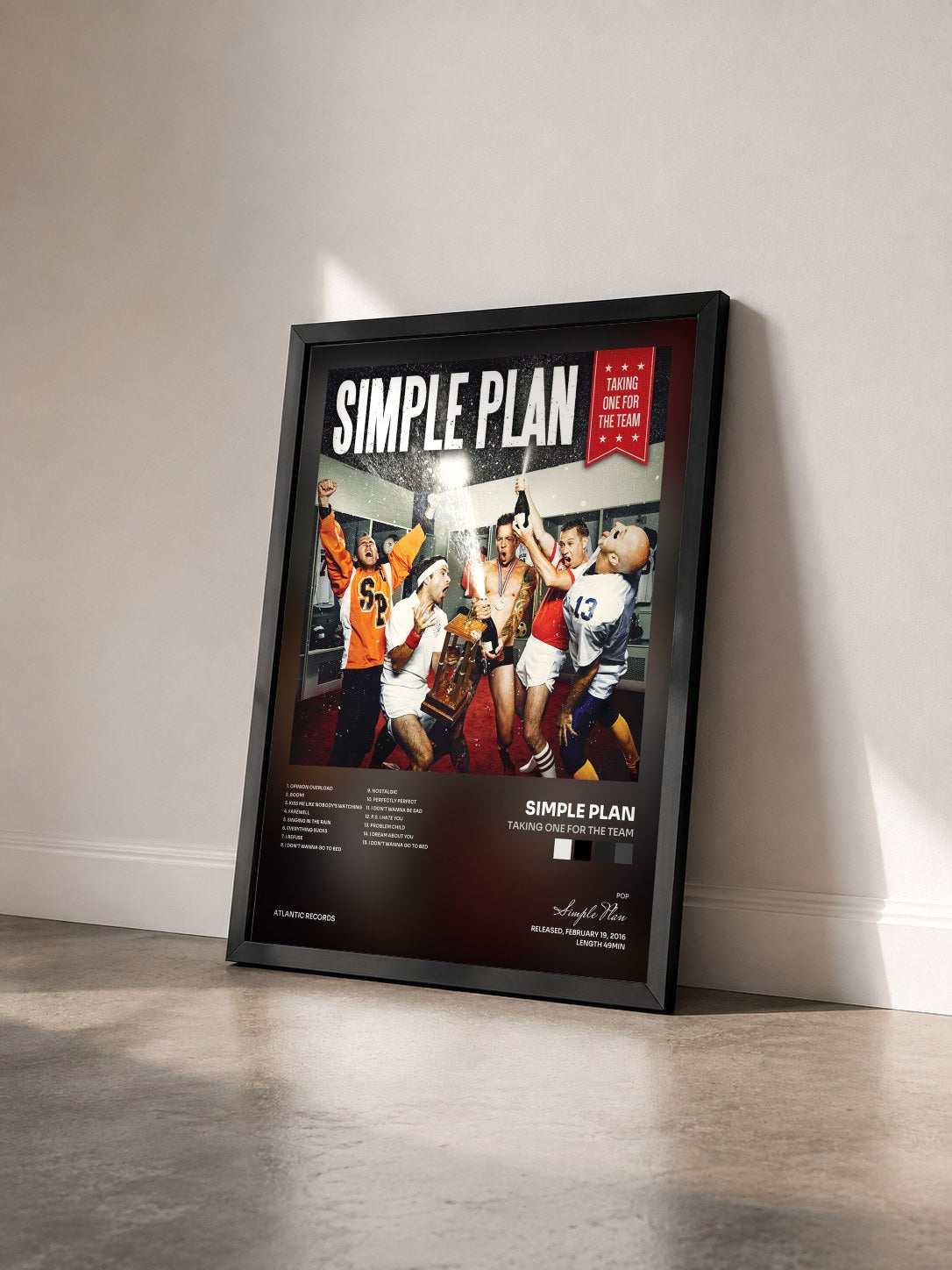 #noir Tableau de l'album Taking One for the Team de Simple Plan vu de trois quarts, cadre noir
