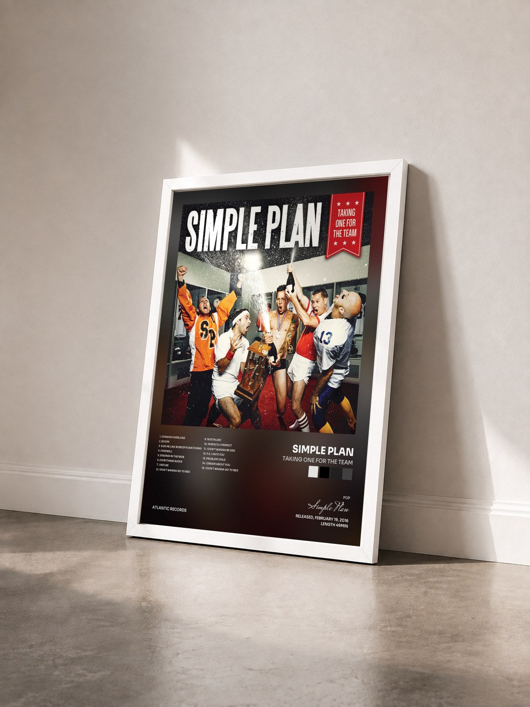 #blanc Tableau de l'album Taking One for the Team de Simple Plan vu de trois quarts, cadre blanc