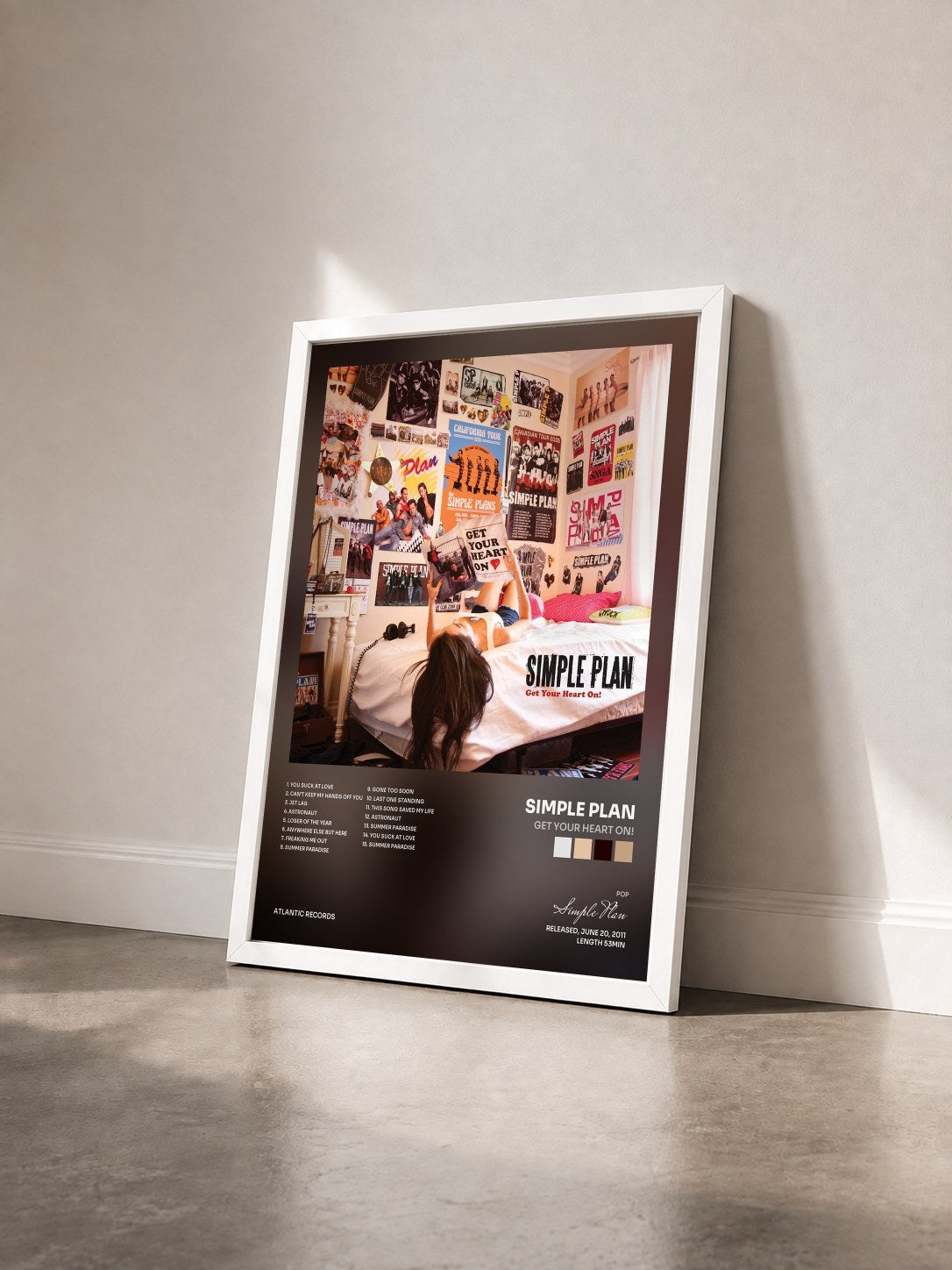 #blanc Tableau de l'album Get Your Heart On! de Simple Plan vu de trois quarts, cadre blanc