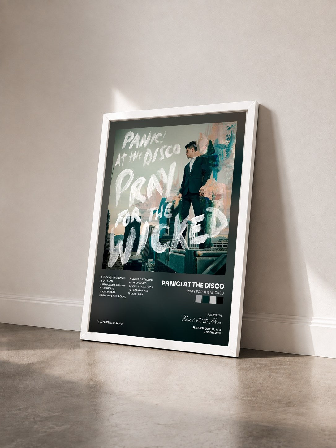 #blanc Pray for the Wicked by Panic! At the Disco as a framed art print seen at an angle, white frame