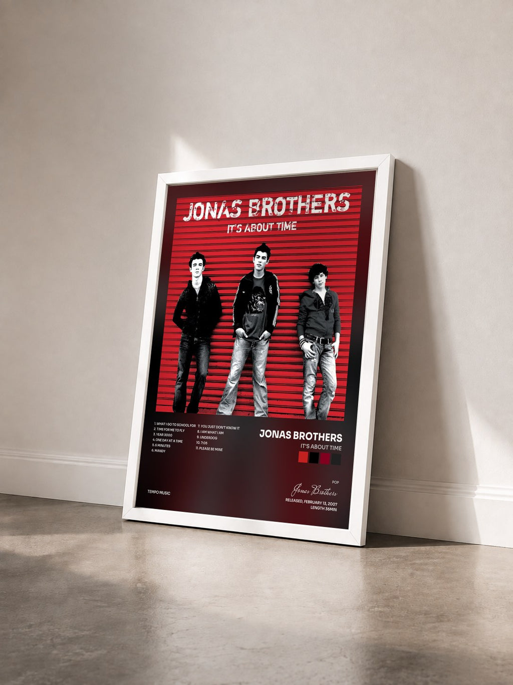 #blanc Tableau de l'album It's About Time de Jonas Brothers vu de trois quarts, cadre blanc