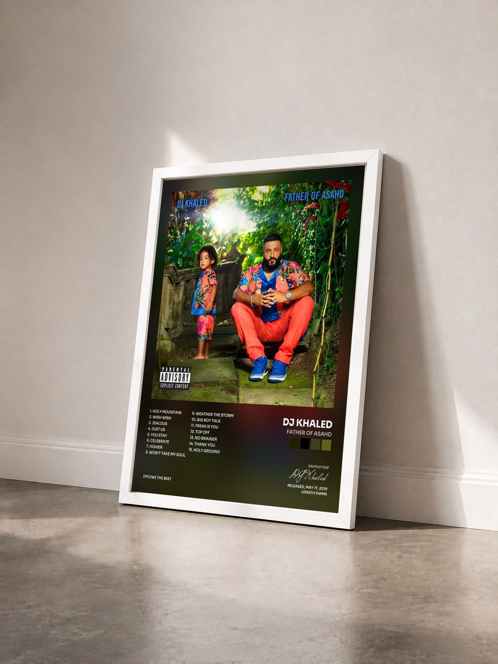 #blanc Tableau de l'album Father Of Asahd de DJ Khaled vu de trois quarts, cadre blanc