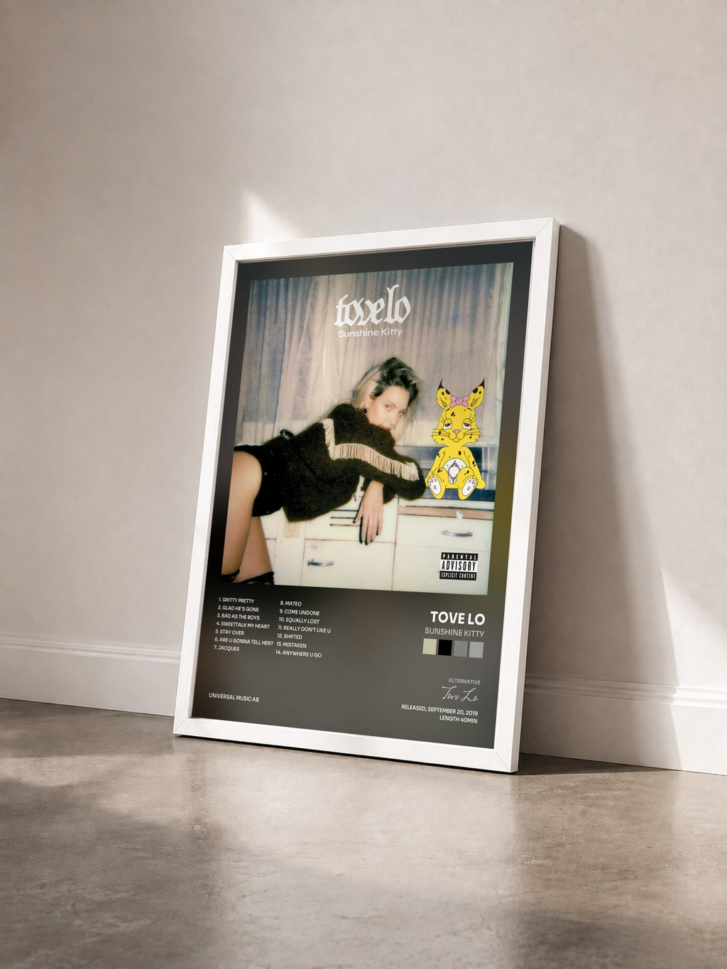 #blanc Tableau de l'album Sunshine Kitty de Tove Lo vu de trois quarts, cadre blanc