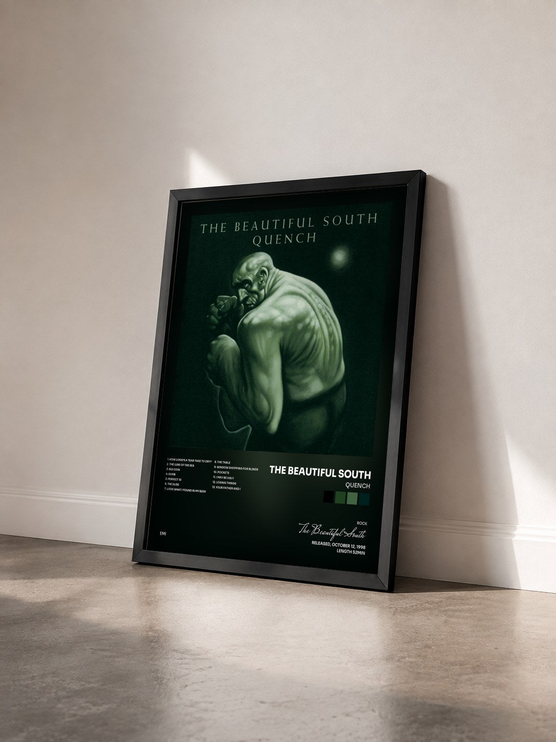 #noir Tableau de l'album Quench de The Beautiful South vu de trois quarts, cadre noir