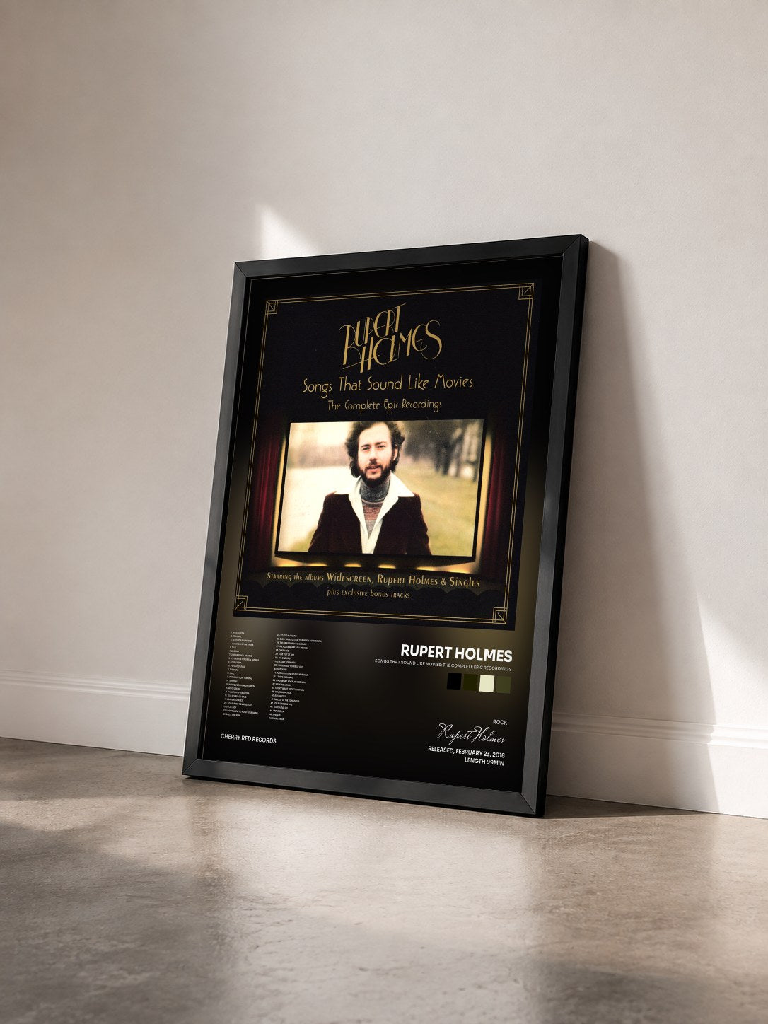 #noir Tableau de l'album Songs That Sound Like Movies: The Complete Epic Recordings de Rupert Holmes vu de trois quarts, cadre noir