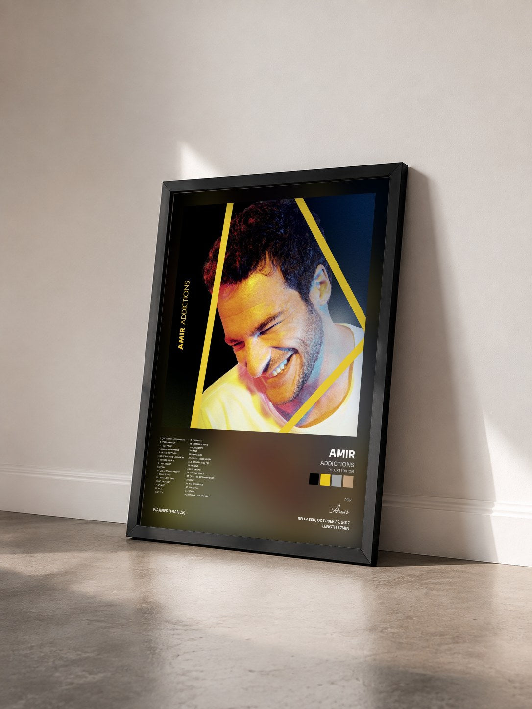 #noir Tableau de l'album Addictions (Deluxe Edition) de Amir vu de trois quarts, cadre noir