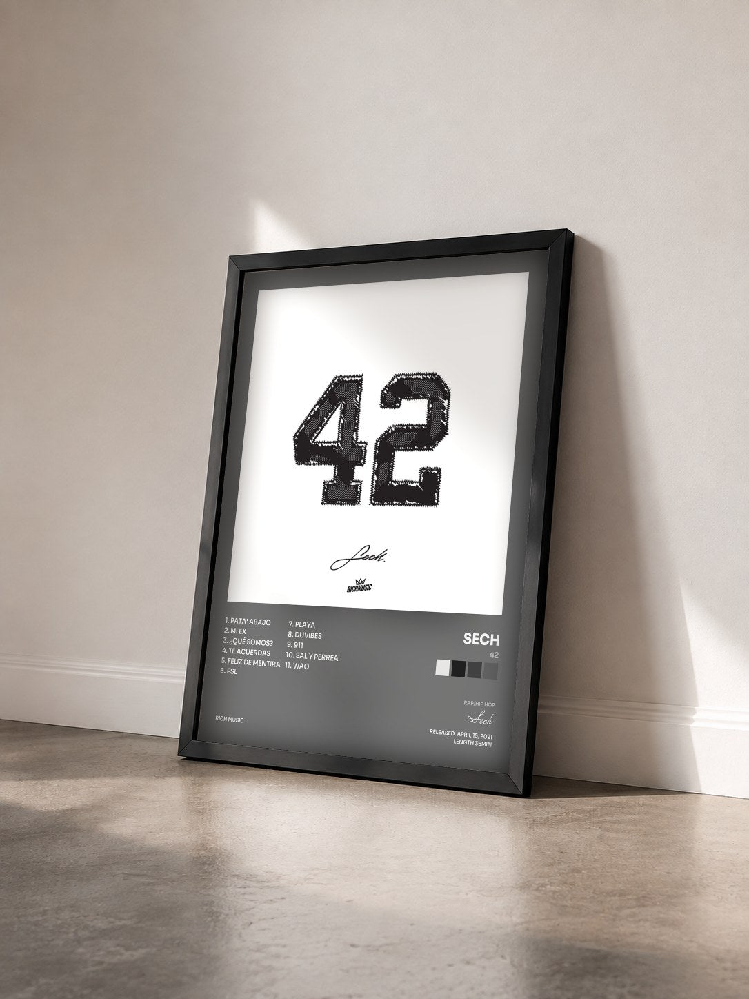 #noir 42 by Sech as a framed art print seen at an angle, black frame