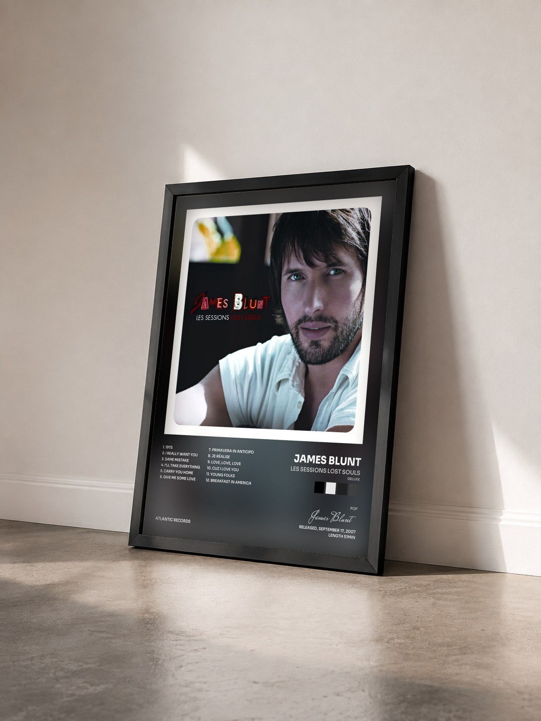 #noir Tableau de l'album Les Sessions Lost Souls (Deluxe) de James Blunt vu de trois quarts, cadre noir