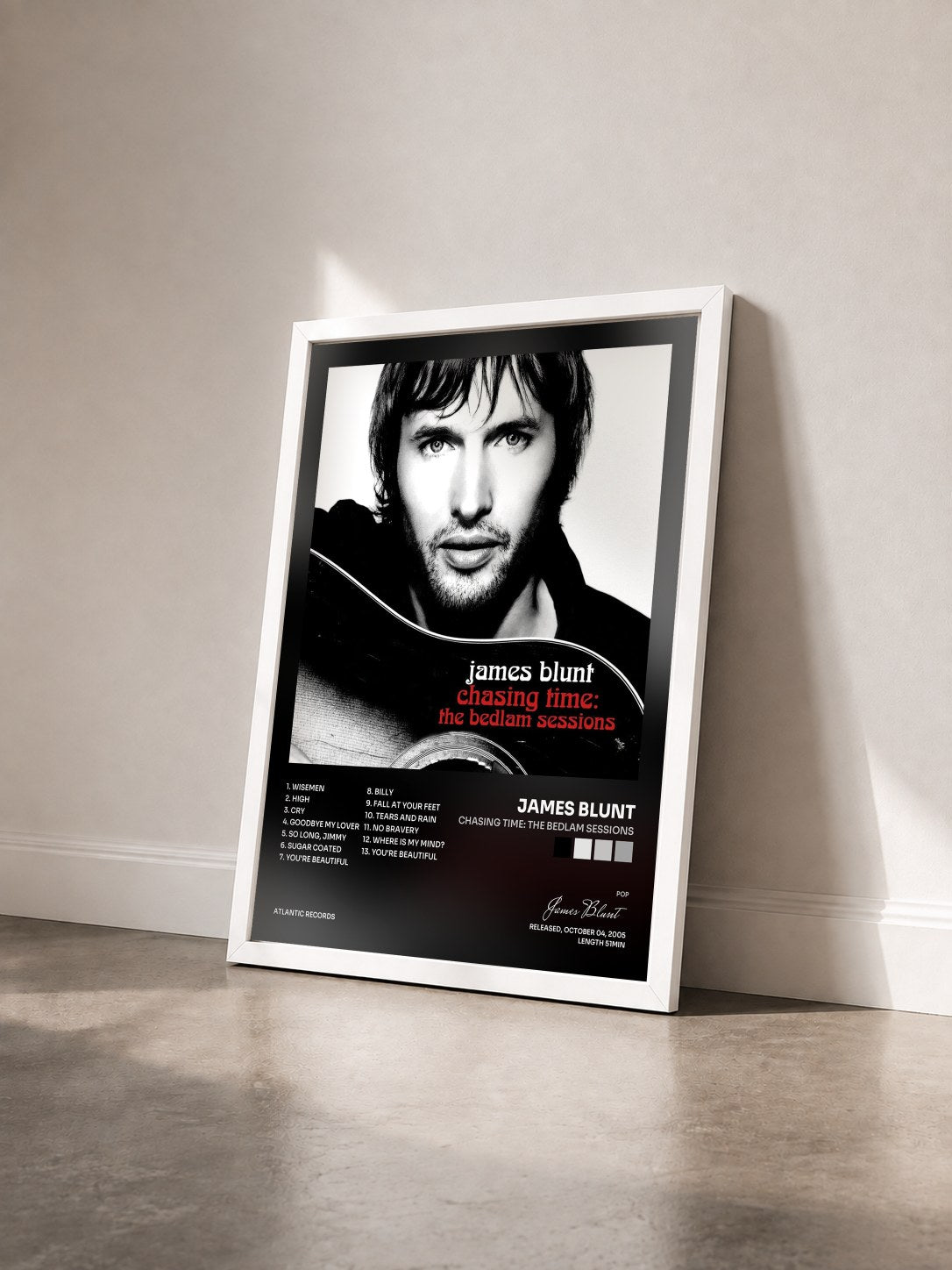 #blanc Tableau de l'album Chasing Time: The Bedlam Sessions de James Blunt vu de trois quarts, cadre blanc