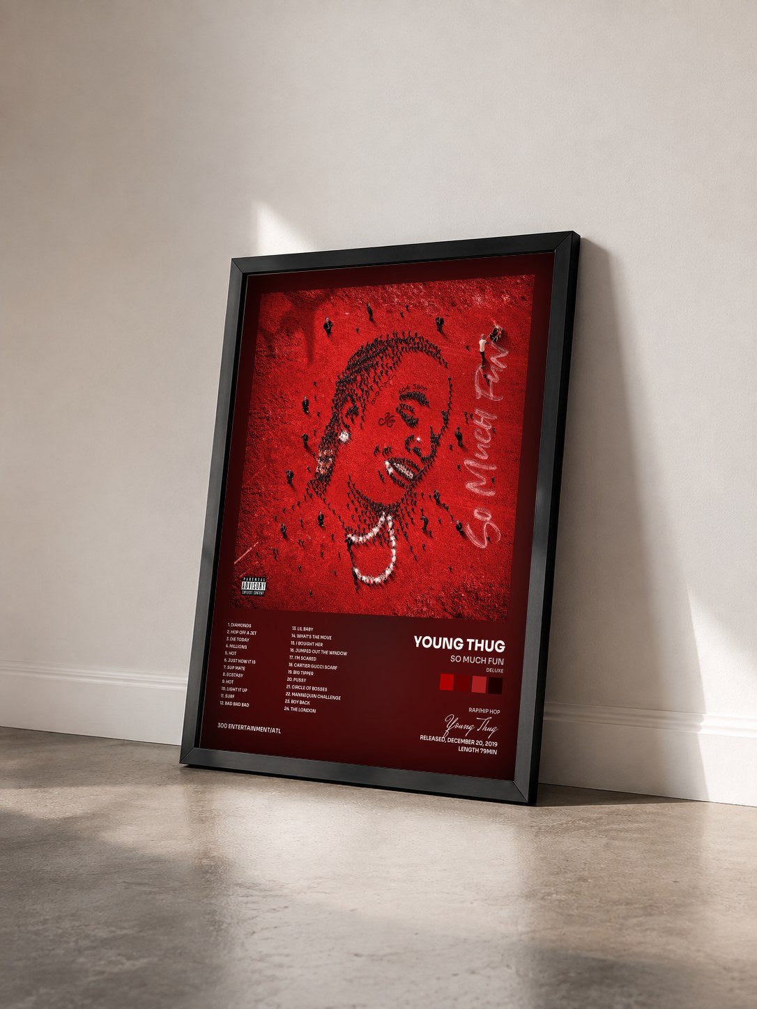#noir Tableau de l'album So Much Fun (Deluxe) de Young Thug vu de trois quarts, cadre noir