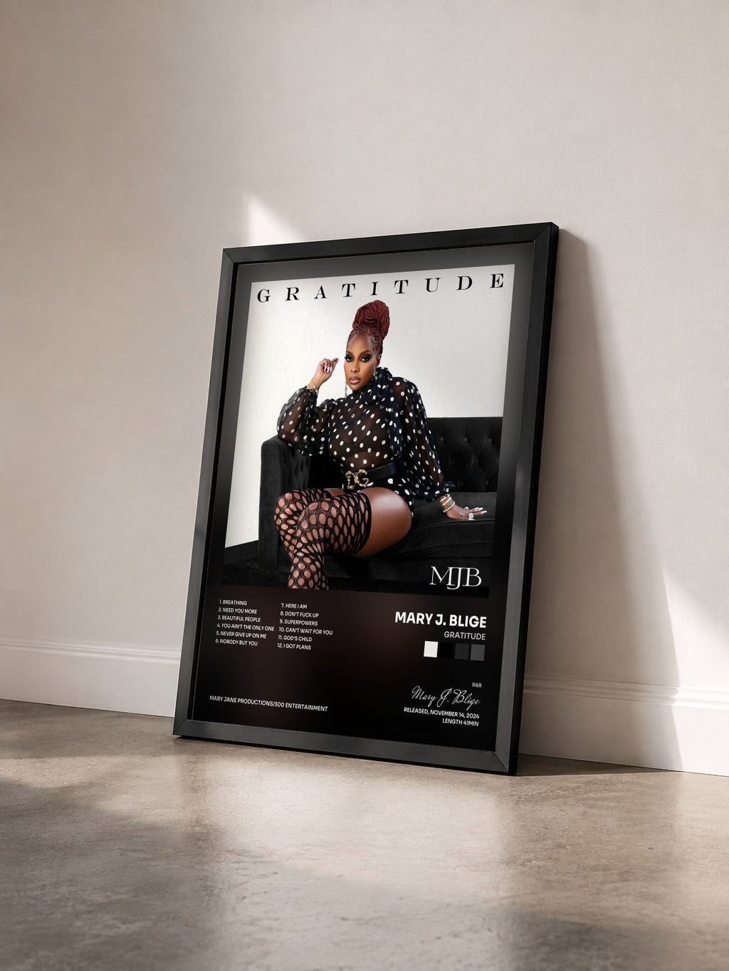 #noir Tableau de l'album Gratitude de Mary J. Blige vu de trois quarts, cadre noir