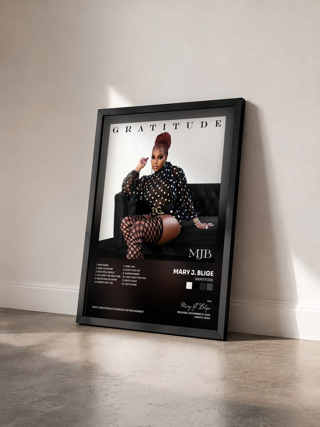 #noir Tableau de l'album Gratitude de Mary J. Blige vu de trois quarts, cadre noir