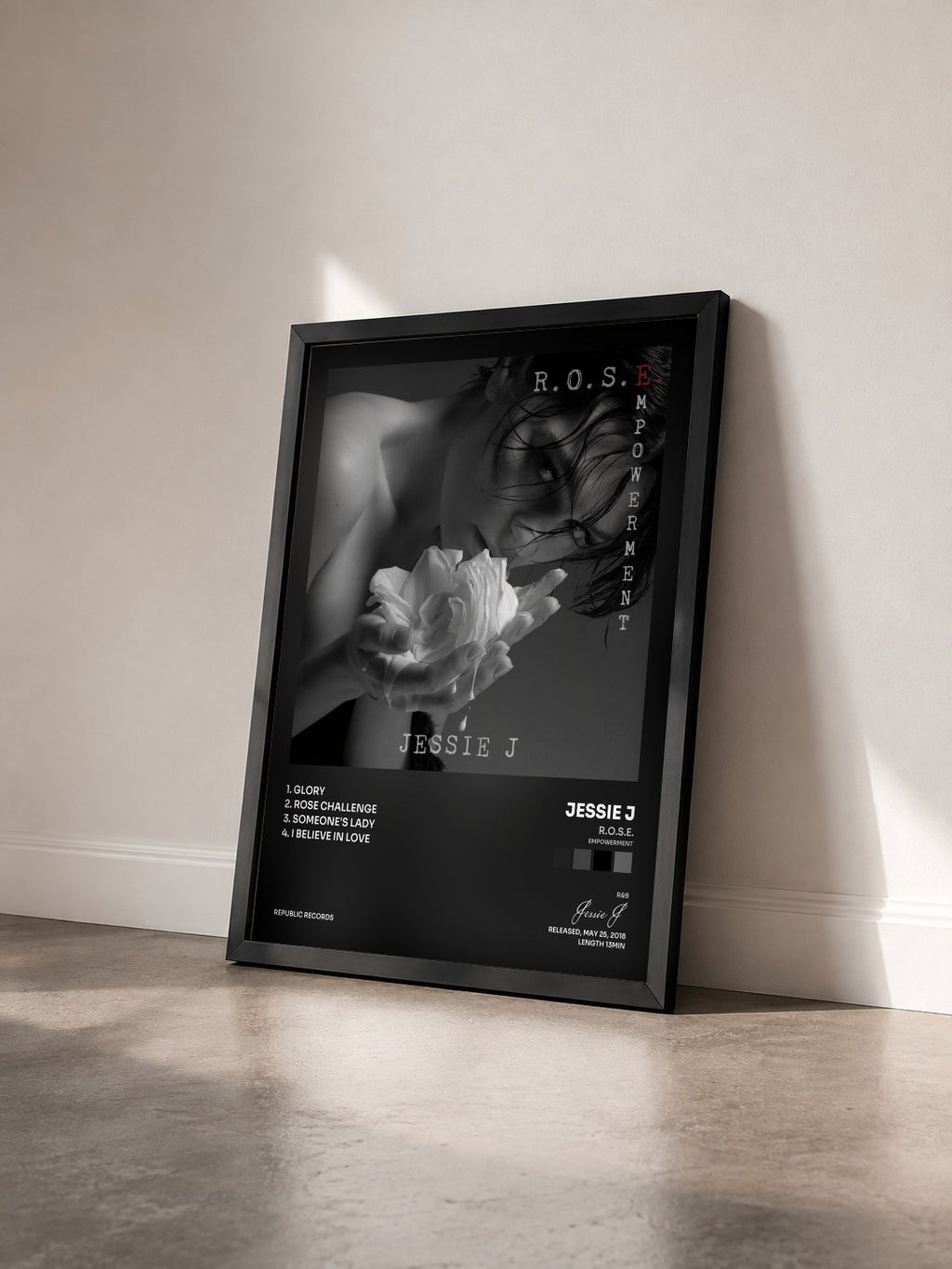 #noir R.O.S.E. (Empowerment) by Jessie J as a framed art print seen at an angle, black frame