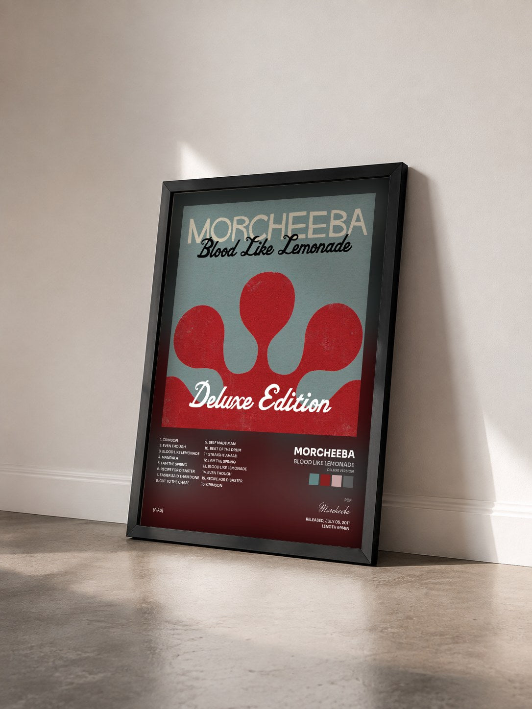 #noir Tableau de l'album Blood Like Lemonade (Deluxe Version) de Morcheeba vu de trois quarts, cadre noir