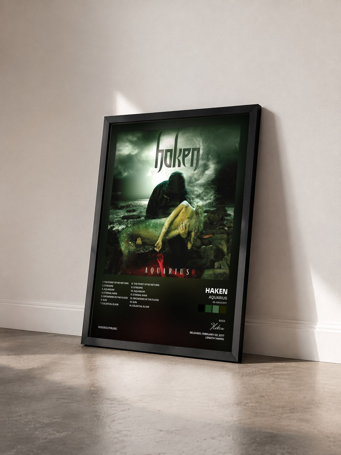#noir Tableau de l'album Aquarius (Re-issue 2017) de Haken vu de trois quarts, cadre noir
