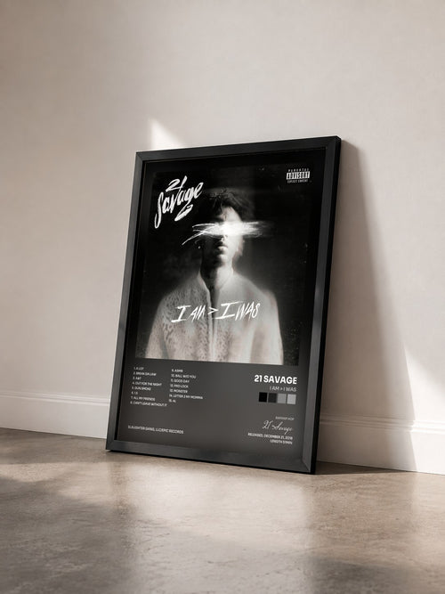 #noir i am > i was by 21 Savage as a framed art print seen at an angle, black frame