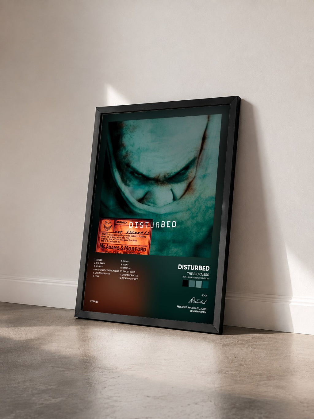 #noir The Sickness (25th Anniversary Edition) by Disturbed as a framed art print seen at an angle, black frame