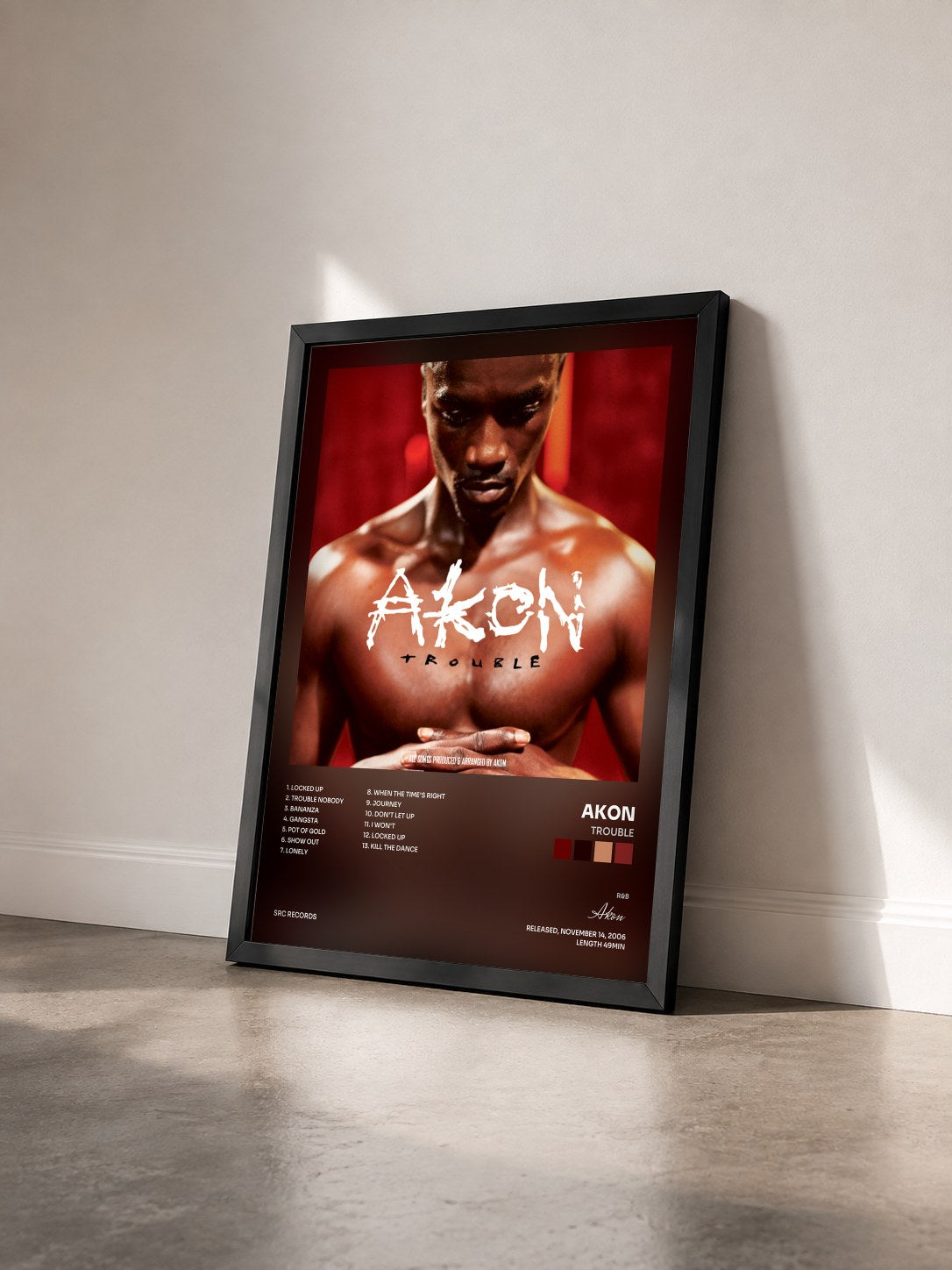 #noir Trouble by Akon as a framed art print seen at an angle, black frame
