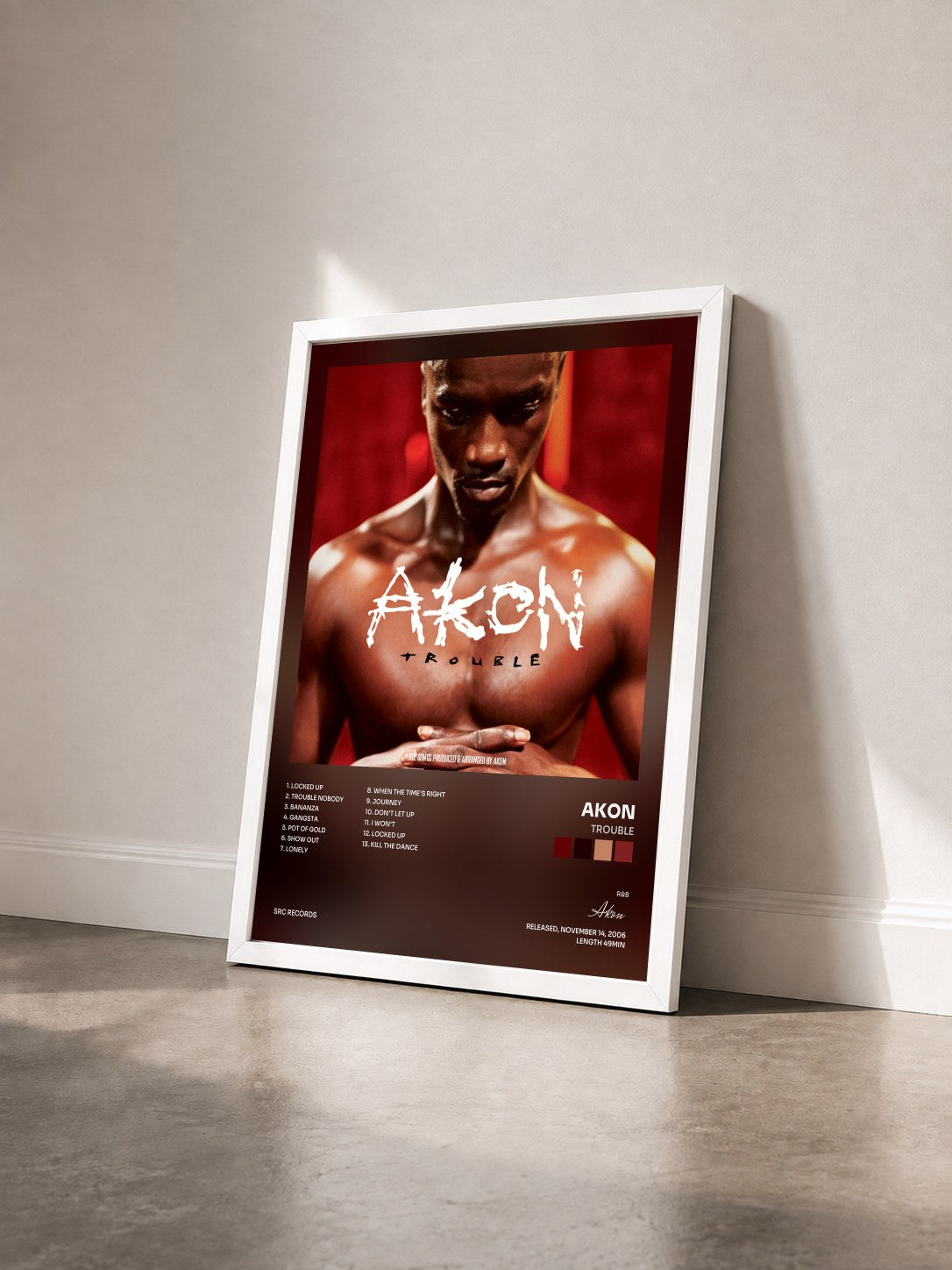 #blanc Trouble by Akon as a framed art print seen at an angle, white frame