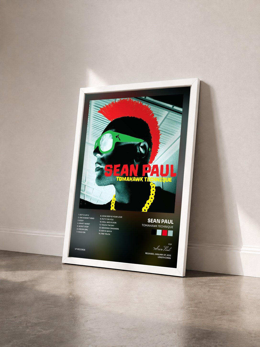 #blanc Tableau de l'album Tomahawk Technique de Sean Paul vu de trois quarts, cadre blanc