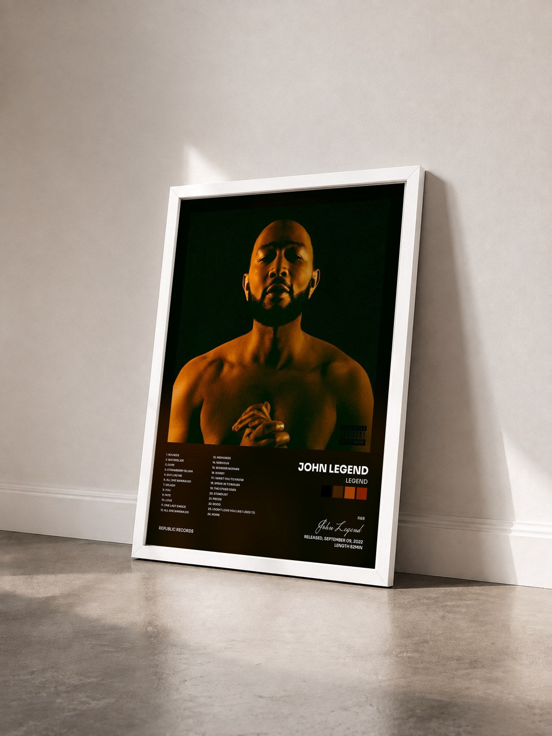 #blanc Tableau de l'album LEGEND de John Legend vu de trois quarts, cadre blanc