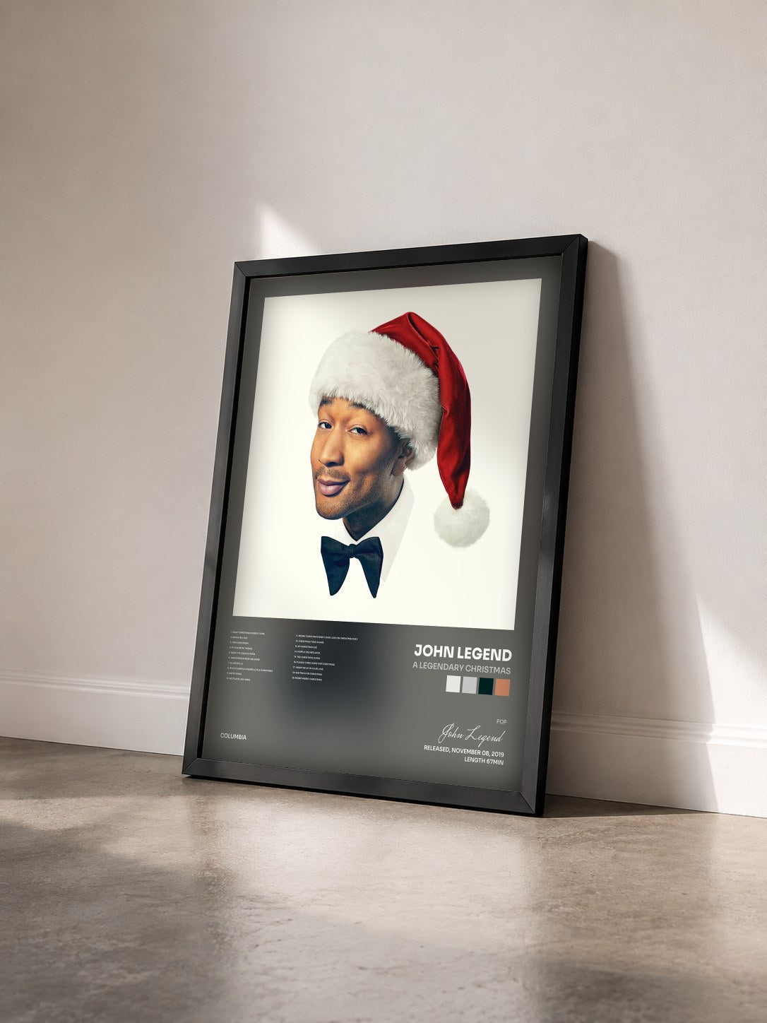 #noir Tableau de l'album A Legendary Christmas de John Legend vu de trois quarts, cadre noir