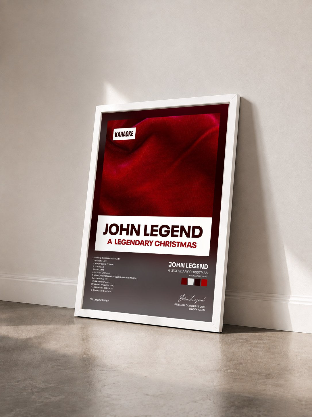 #blanc Tableau de l'album A Legendary Christmas (Karaoke Versions) de John Legend vu de trois quarts, cadre blanc