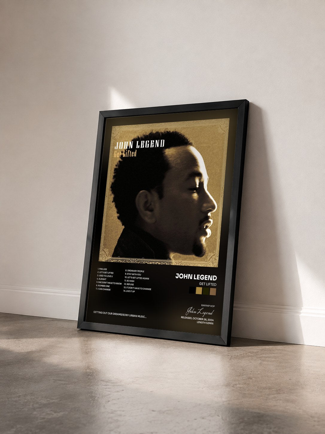 #noir Tableau de l'album Get Lifted de John Legend vu de trois quarts, cadre noir