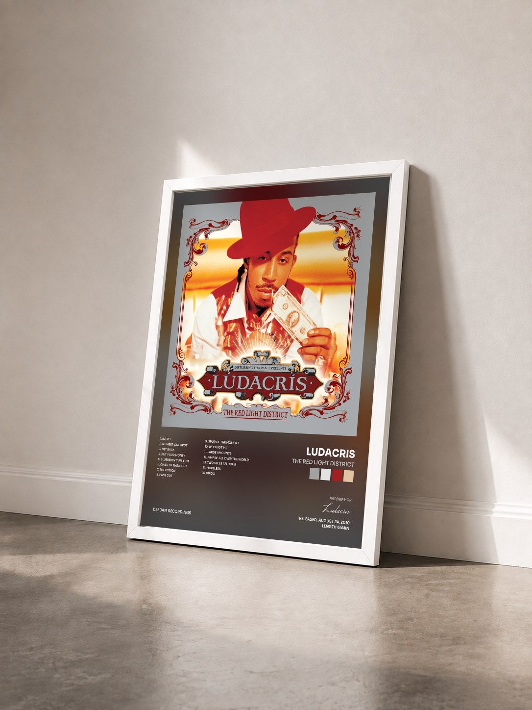 #blanc Tableau de l'album The Red Light District de Ludacris vu de trois quarts, cadre blanc