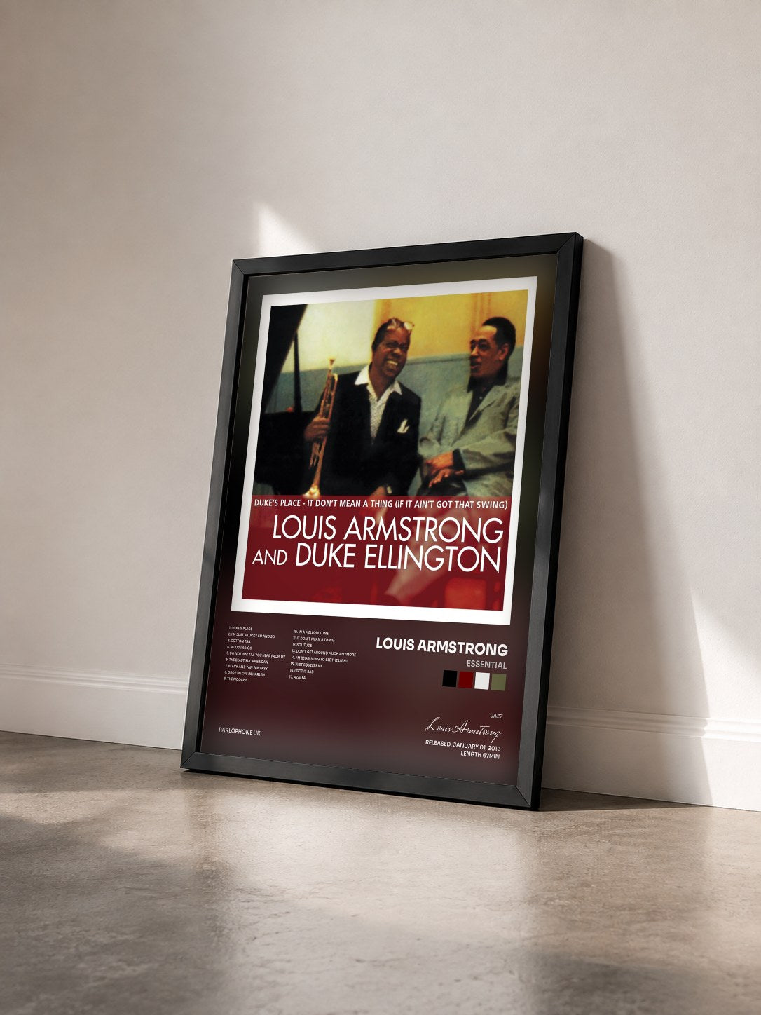 #noir Tableau de l'album Essential de Louis Armstrong vu de trois quarts, cadre noir