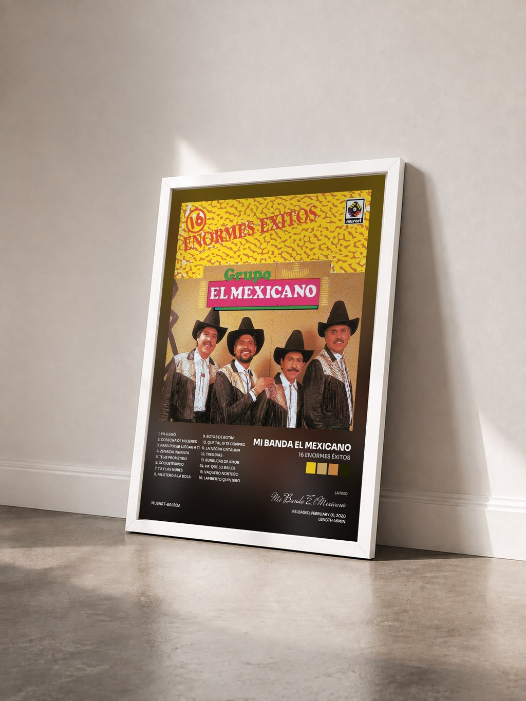 #blanc 16 Enormes Éxitos by Mi Banda El Mexicano as a framed art print seen at an angle, white frame