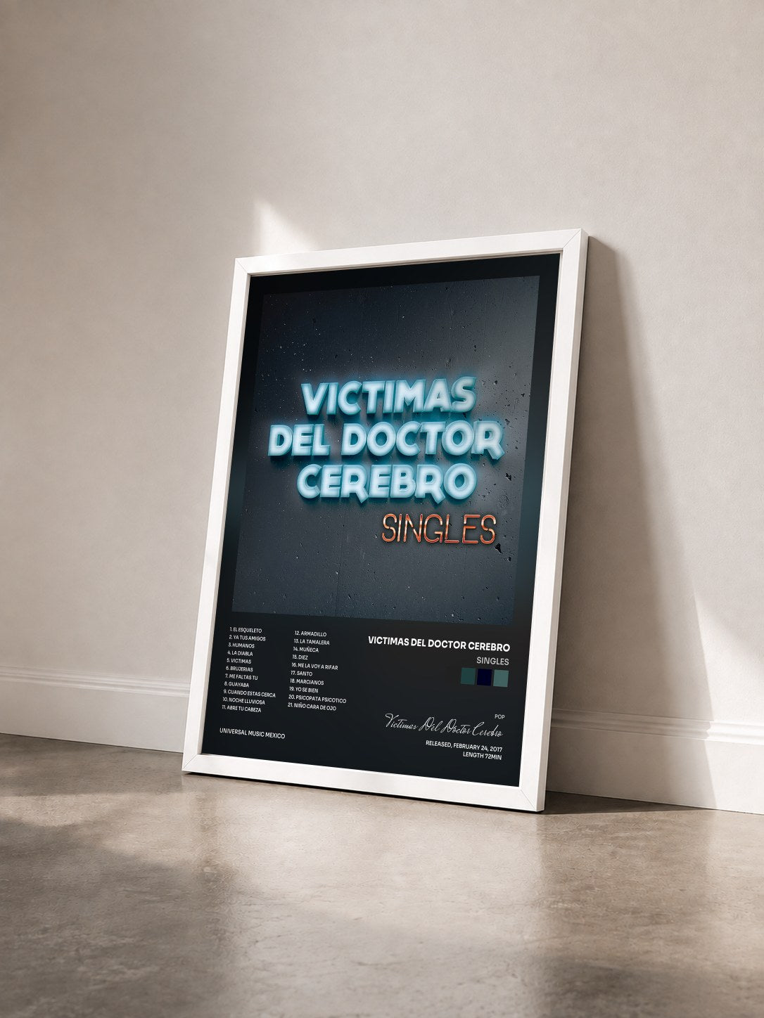 #blanc Tableau de l'album Singles de Victimas Del Doctor Cerebro vu de trois quarts, cadre blanc