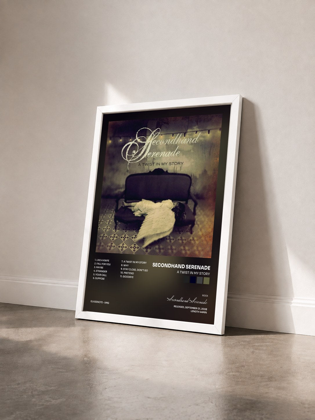 #blanc Tableau de l'album A Twist In My Story de Secondhand Serenade vu de trois quarts, cadre blanc