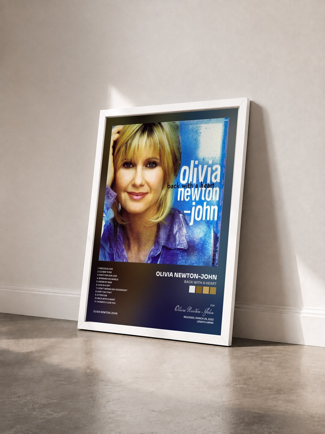 #blanc Tableau de l'album Back With A Heart de Olivia Newton-John vu de trois quarts, cadre blanc