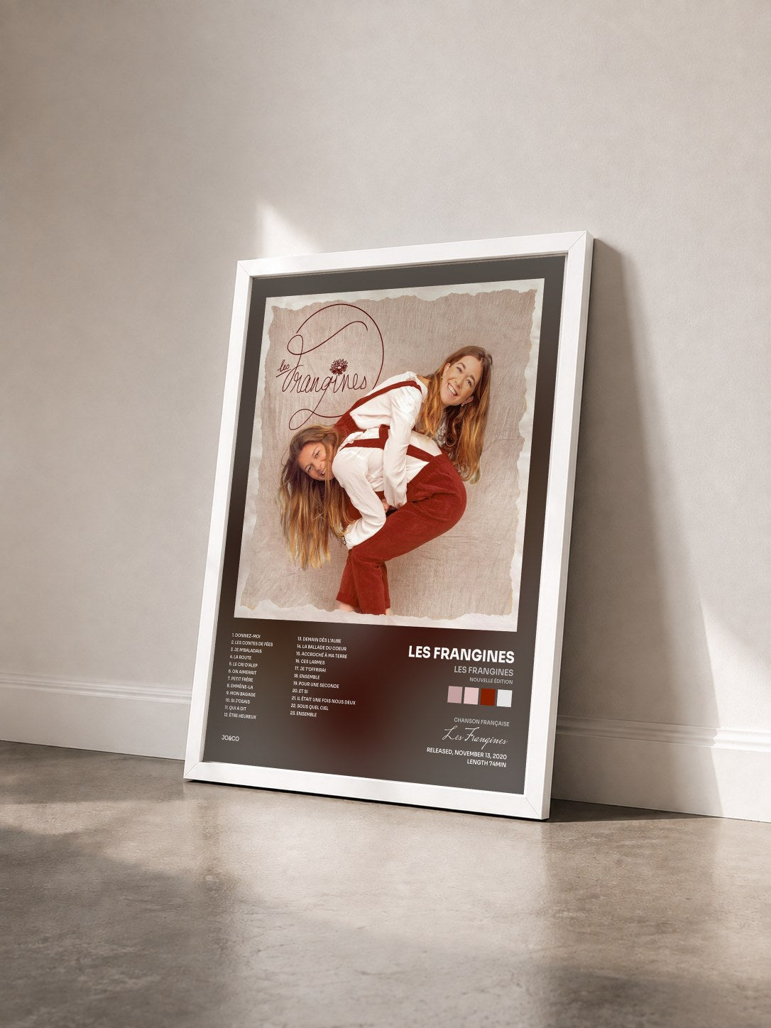 #blanc Tableau de l'album Les Frangines (Nouvelle édition) de Les Frangines vu de trois quarts, cadre blanc