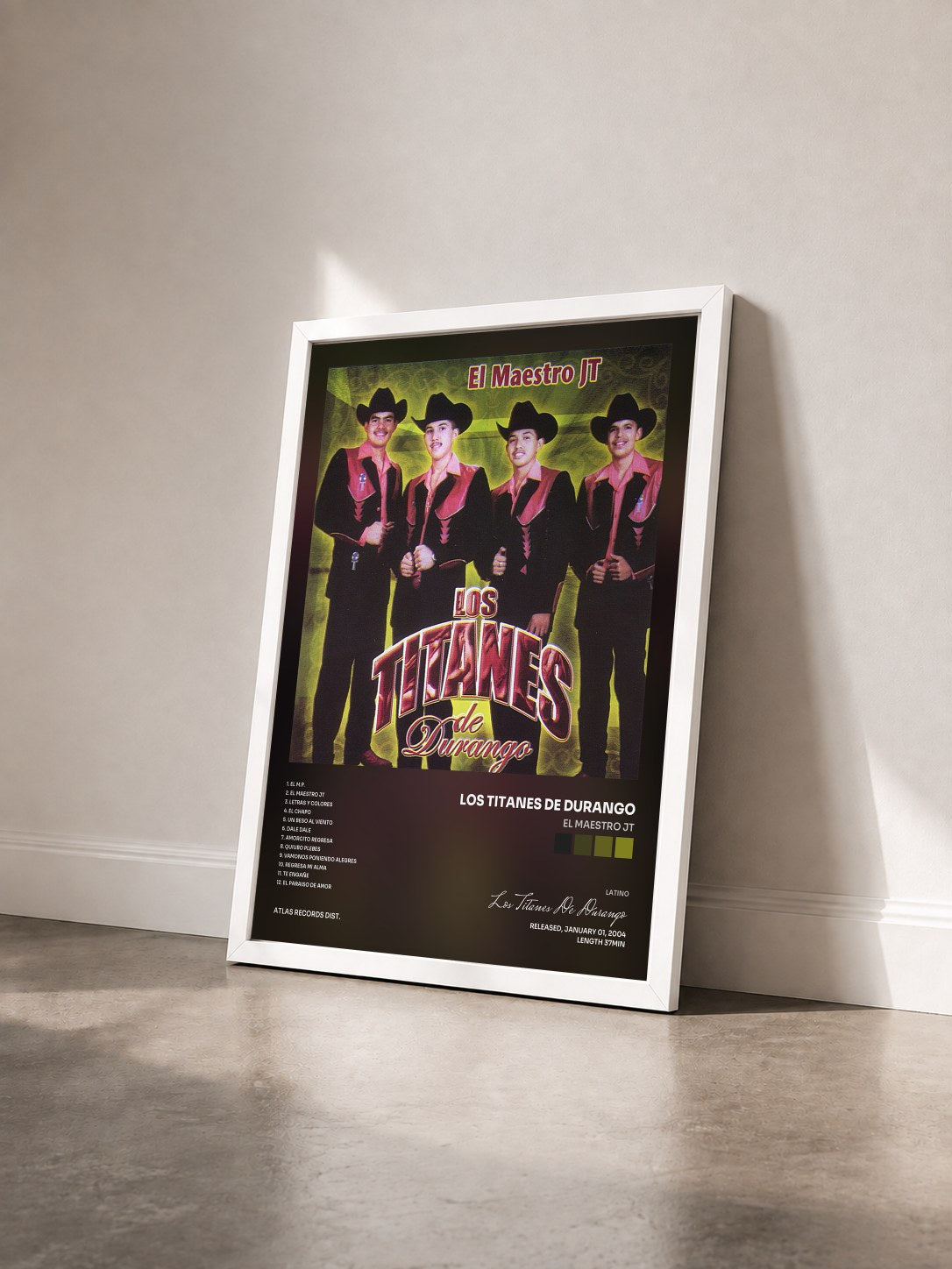 #blanc Tableau de l'album El Maestro JT de Los Titanes De Durango vu de trois quarts, cadre blanc