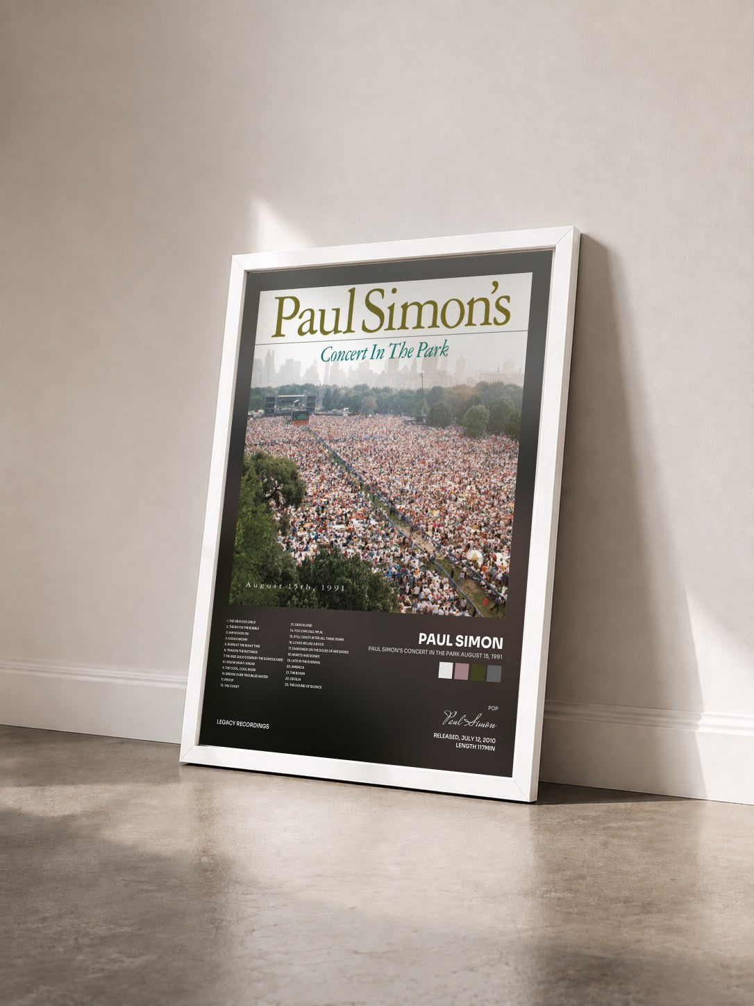 #blanc Tableau de l'album Paul Simon's Concert In The Park August 15, 1991 de Paul Simon vu de trois quarts, cadre blanc