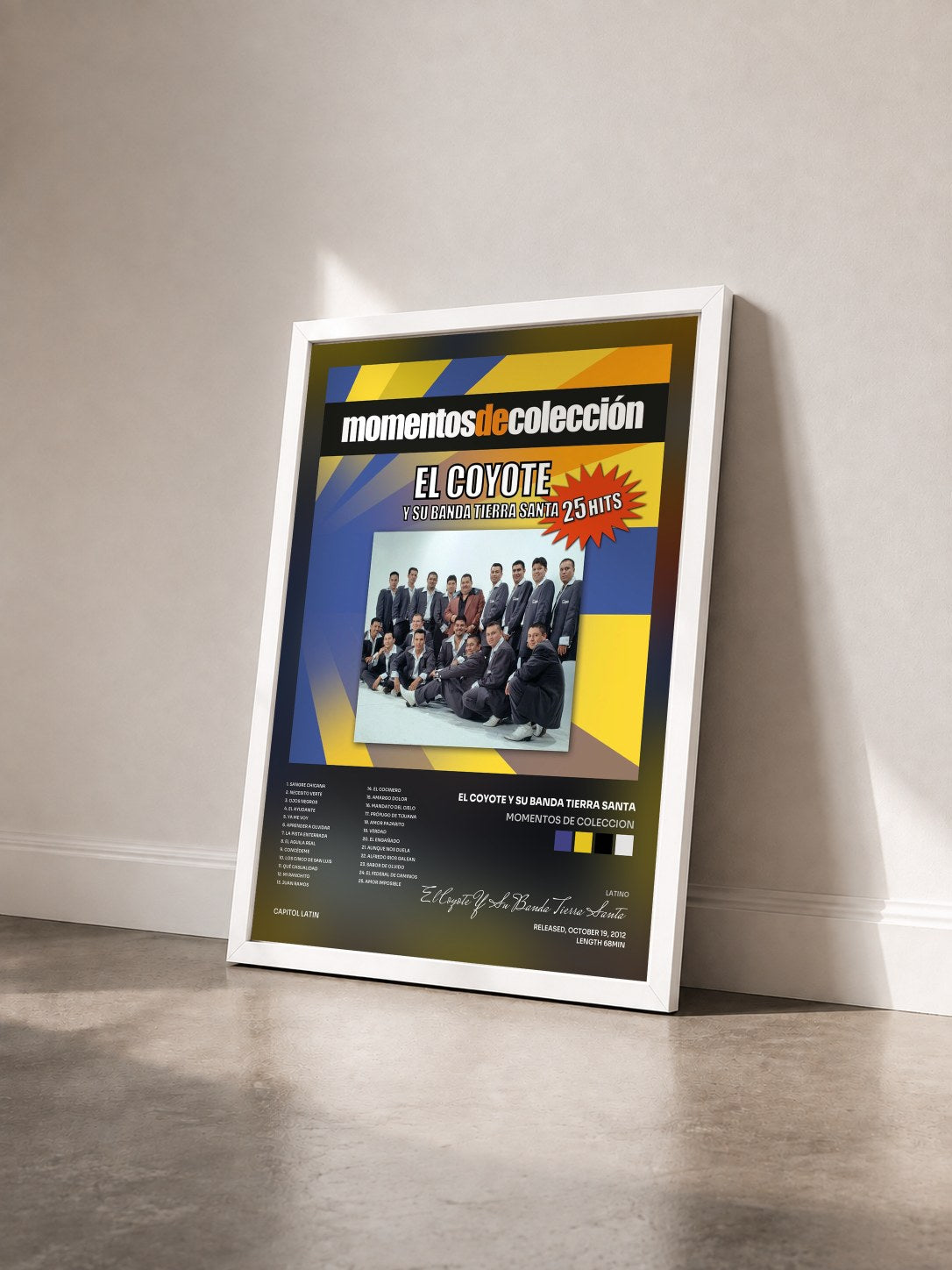 #blanc Tableau de l'album Momentos De Coleccion de El Coyote Y Su Banda Tierra Santa vu de trois quarts, cadre blanc