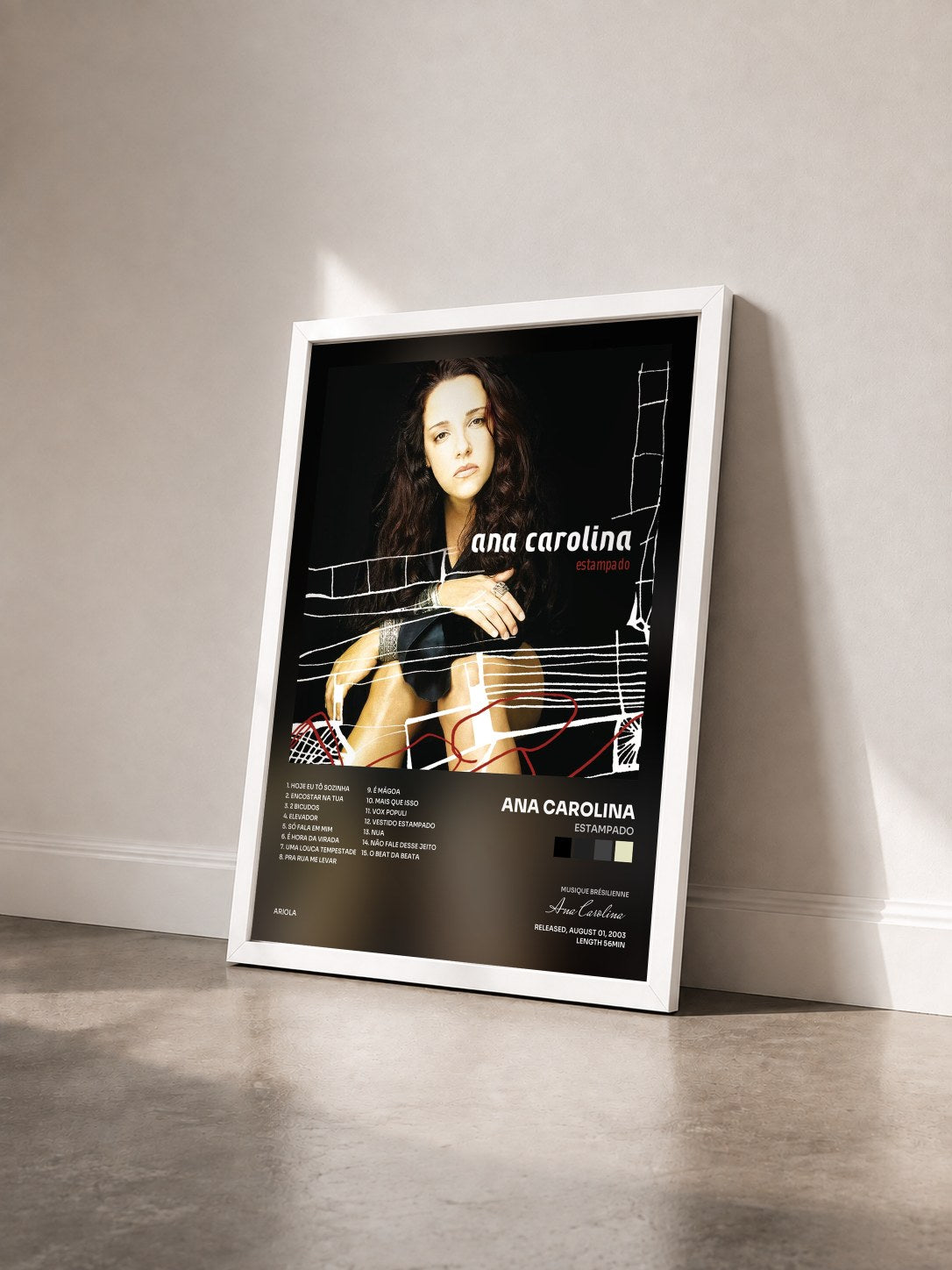 #blanc Tableau de l'album Estampado de Ana Carolina vu de trois quarts, cadre blanc