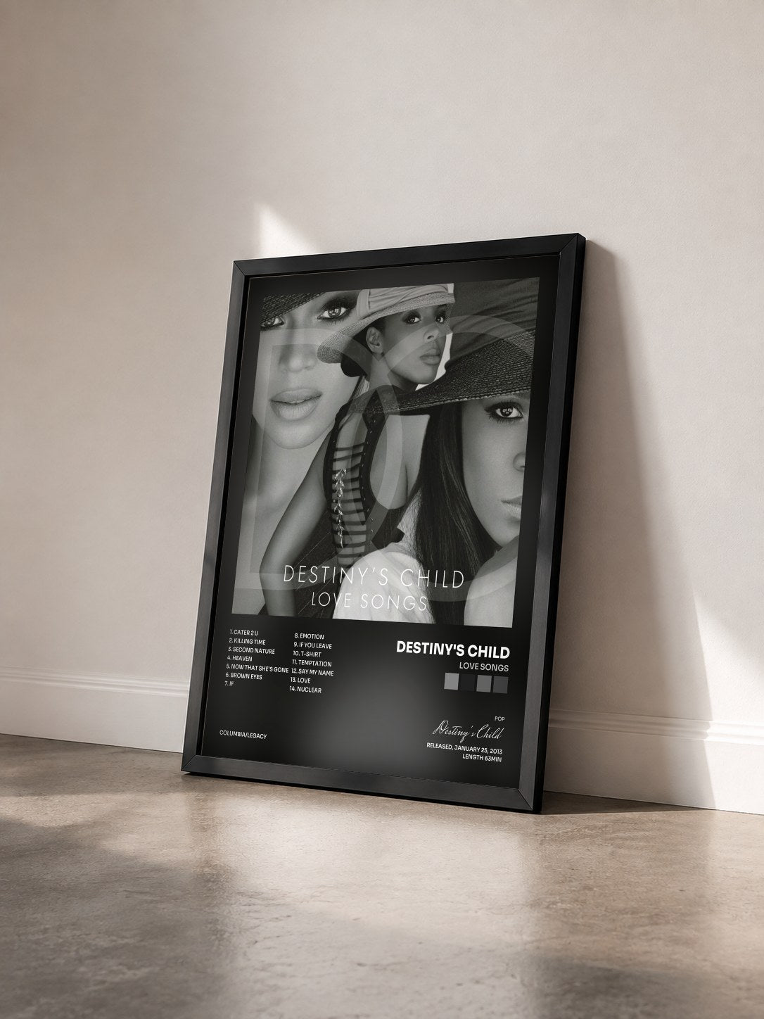 #noir Tableau de l'album Love Songs de Destiny's Child vu de trois quarts, cadre noir