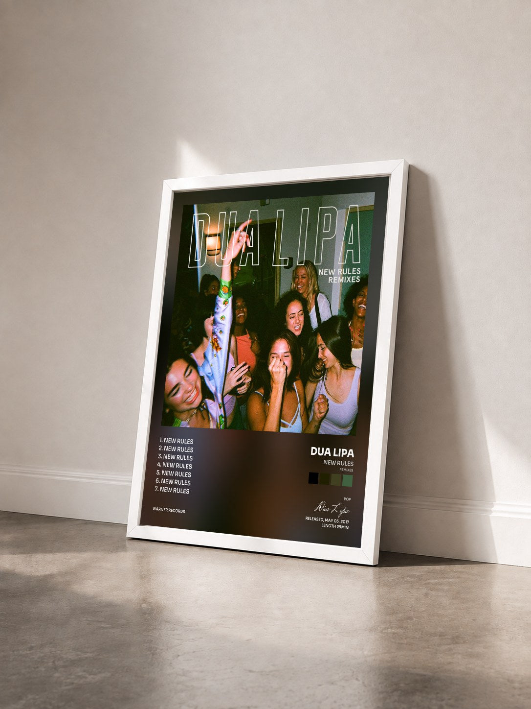 #blanc Tableau de l'album New Rules (Remixes) de Dua Lipa vu de trois quarts, cadre blanc