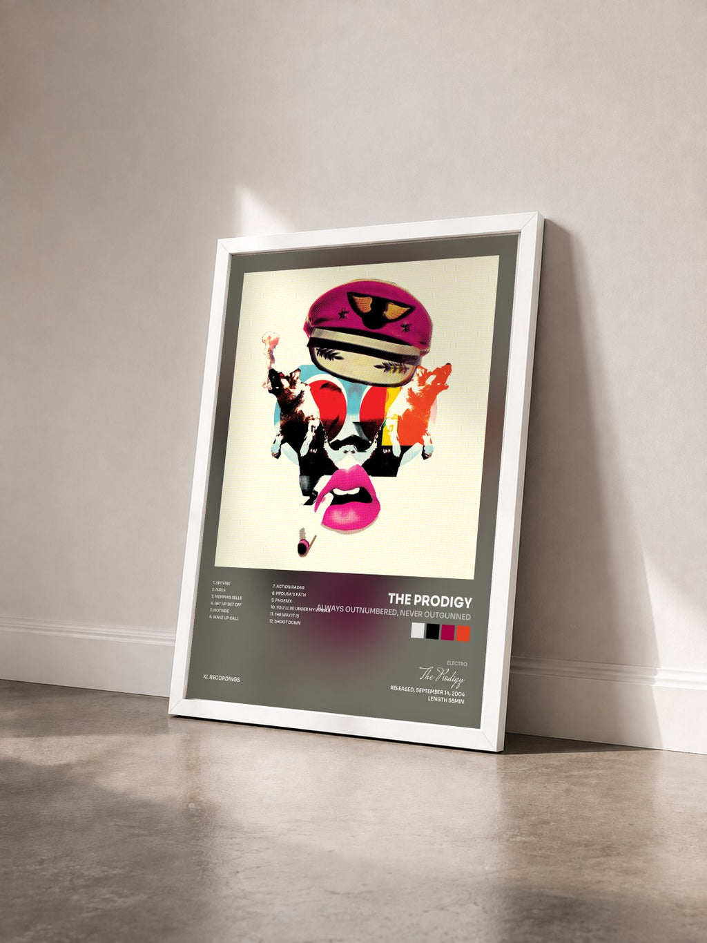 #blanc Tableau de l'album Always Outnumbered, Never Outgunned de The Prodigy vu de trois quarts, cadre blanc